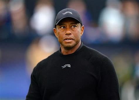how old is tiger woods.